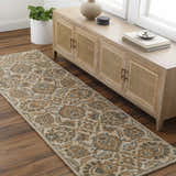 Entryway with a beige and brown floral Teom Area Rug runner, light wood console table, and wood floors. Roomscene-Runner