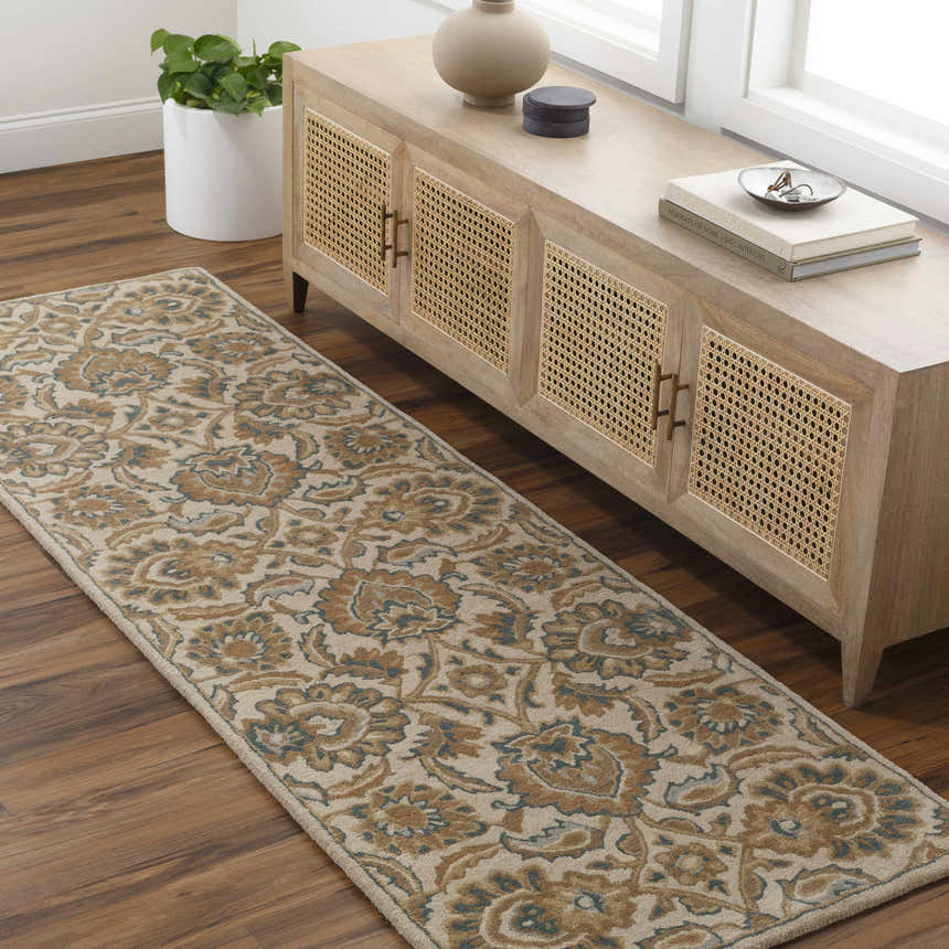 Entryway with a beige and brown floral Teom Area Rug runner, light wood console table, and wood floors. Roomscene-Runner