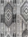 Close-up of the Thatcham Area Rug, featuring a Bohemian-inspired geometric pattern in black, gray, ivory, and silver gray. Design-Rectangle-710103