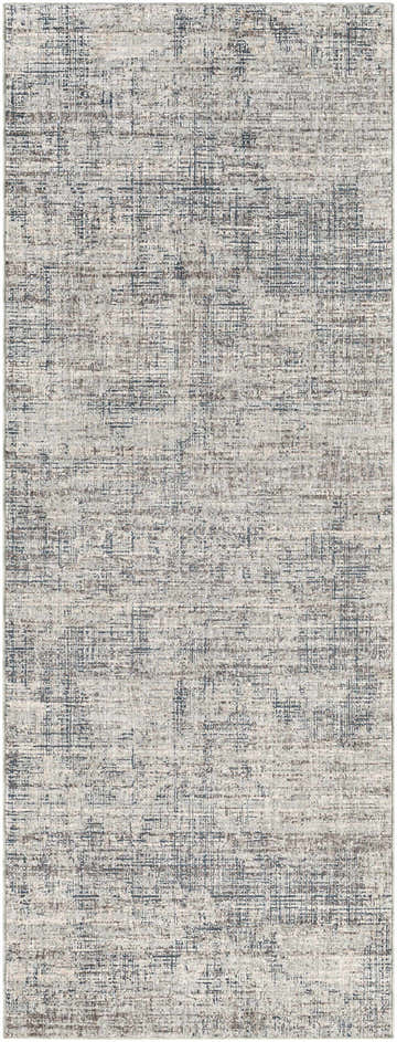 Close-up of the Thornhill Carved Statement Rug. Contemporary design with blue, charcoal, and gray abstract pattern. Design-Runner-338