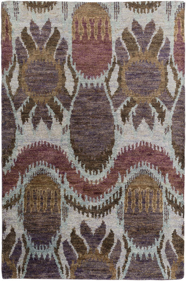 Close-up of the Thornville Jute Carpet. Southwestern style rug in brown, purple, plum, and pale blue hues. Hand knotted texture. Design-Rectangle-58