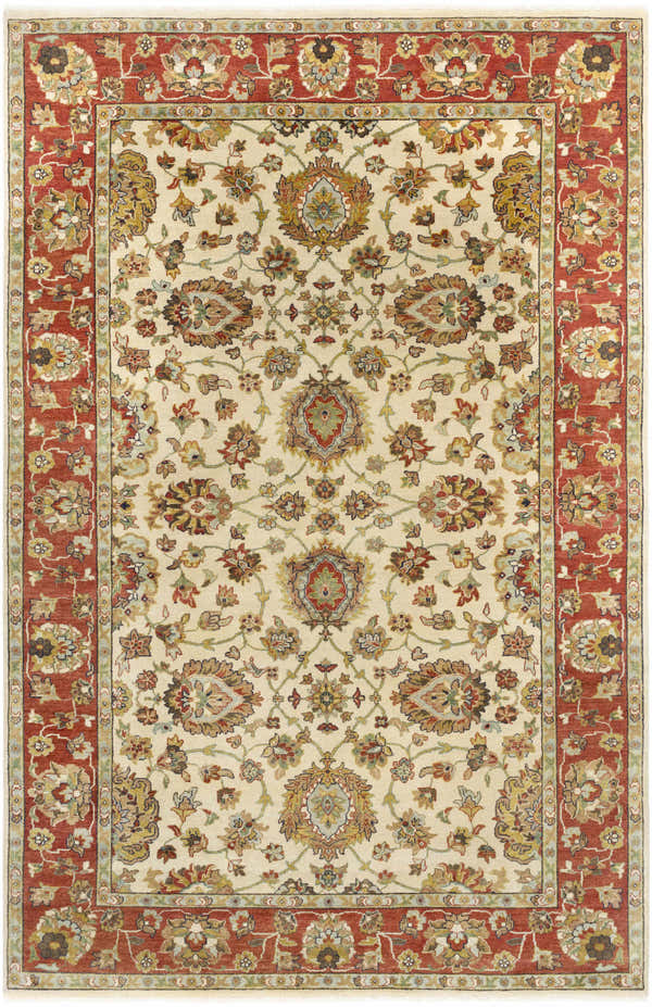 Close-up of the Throop Clearance Rug. Hand-knotted wool rug with a traditional floral pattern in cream, red, gold and brown. Design-Rectangle