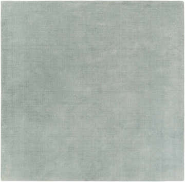 Close-up of the hand-loomed Brockton Solid Dusty Sage Wool Rug. Soft texture and subtle striped pattern. Design-Square-8