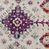 Close-up of the Tigrim Beige 2306 rug showing its bohemian pattern in beige, ivory, navy, and pink. Texture