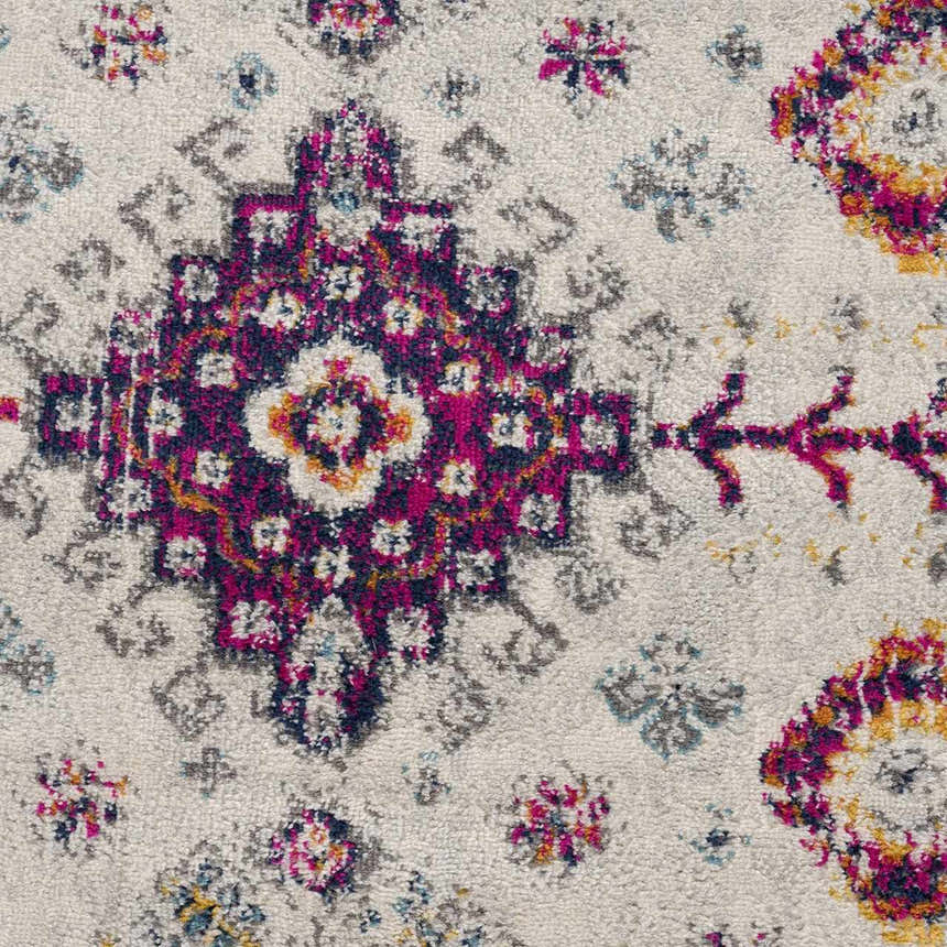 Close-up of the Tigrim Beige 2306 rug showing its bohemian pattern in beige, ivory, navy, and pink. Texture