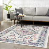 Living room scene with gray sofa and Tigriv Ivory 2312 rug. Bohemian style rug in ivory, navy, gray, and orange. Roomscene-Rectangle