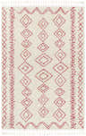 Close-up of the Tinawagan Area Rug. Cream rug with red diamond and geometric pattern and tassels. Farmhouse style. Design-Rectangle-537