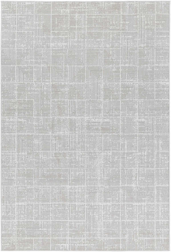 Close-up of the Telyn Area Rug, a contemporary rug with a slate blue geometric square pattern. Design-Rectangle-5373