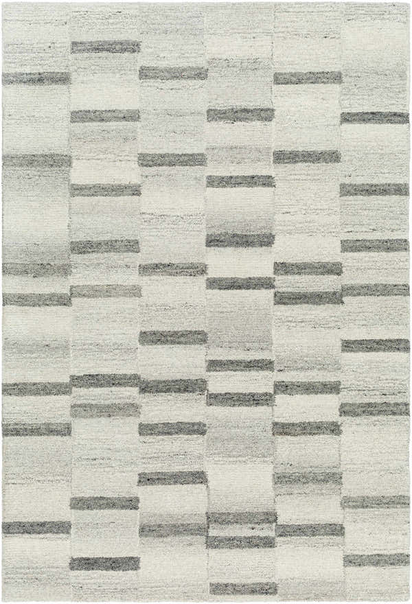 Close-up of the hand-tufted Timmy Area Rug. Light silver wool rug with a contemporary slate blue and sage geometric pattern. Design-Rectangle-576