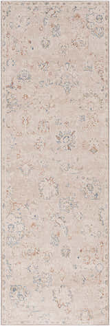 Close-up of the Tinampo Area Rug. Bohemian style rug in brick red, cream, and denim floral pattern. Machine woven polyester. Design-Runner-268