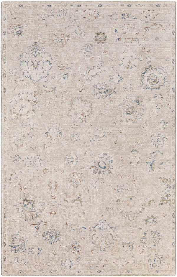 Close-up of the Tinampo Area Rug, a machine-woven polyester rug with a cream background and blue, olive, and rust floral accents. Design-Rectangle-579