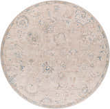 Close-up of round Tinampo Area Rug. Bohemian style with brick red, cream, denim, and light gray floral pattern. Design-Round-710
