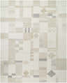 Close-up of the Tovah Area Rug. Hand-tufted wool rug with a contemporary geometric pattern in ash and light silver tones. Design-Rectangle-810