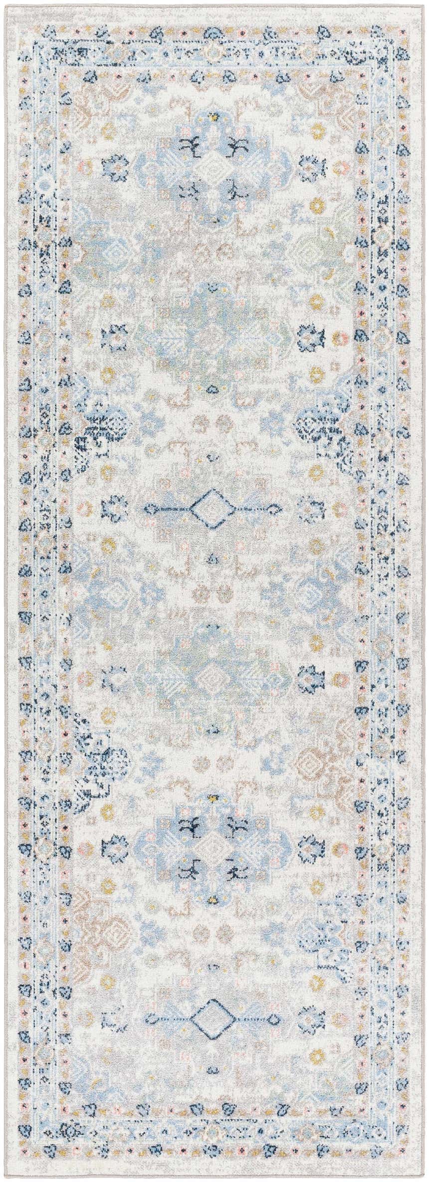 Close-up of Tana Washable Area Rug in Arctic Stone, featuring a traditional, farmhouse-style pattern in blues, grays, and creams. Design-Runner-2773