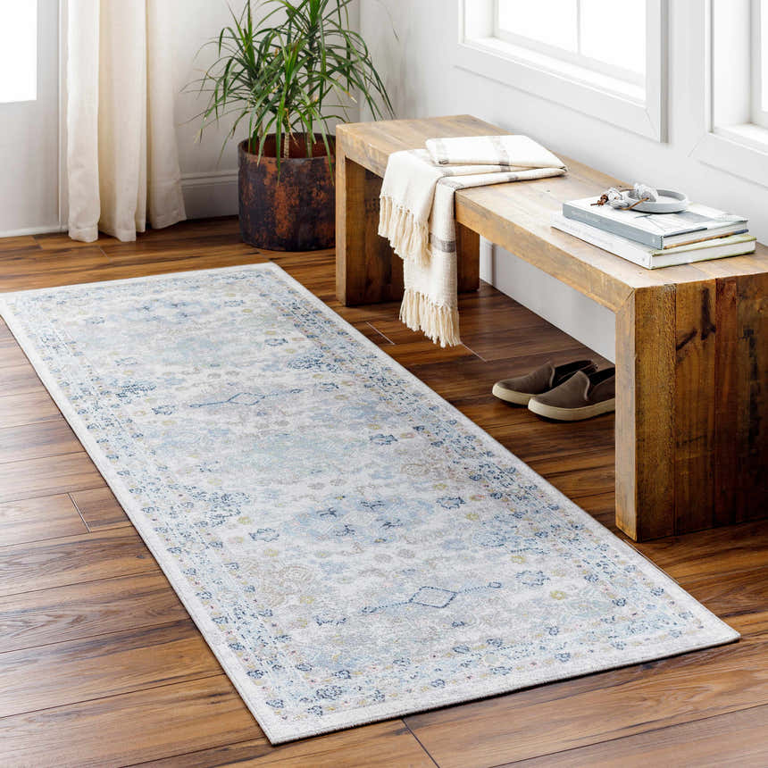 Entryway with wood bench and Tana Washable Area Rug in Arctic Stone, a farmhouse style runner with blue and gray floral pattern. Roomscene-Runner