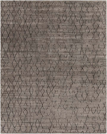Close-up of the Tomakin Area Rug: a hand-knotted, rectangular rug in black, charcoal, and gray with a geometric diamond pattern. Design-Rectangle-810