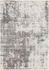 Close-up of the Tonalea Carved Statement Area Rug. Abstract pattern in shades of gray, ivory, and blue. Machine woven texture. Design-Rectangle-582