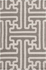 Close-up of the Tooele Area Carpet. Hand-woven wool rug with a cream and tan geometric pattern. Design-Rectangle