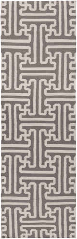 Close-up of the hand woven Tooele Area Carpet. Cream and tan wool rug with a geometric, maze-like pattern. Design-Runner-268