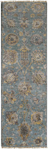 Close-up of the hand-knotted Toquerville Premium Rug in aqua, charcoal, oatmeal, and wheat with a traditional floral pattern. Design-Runner-268