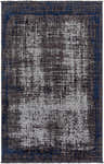 Close-up of the Binh Black Area Rug, showcasing its charcoal, navy, and pale blue contemporary design and chenille-polyester texture. Design-Rectangle-537
