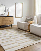 Living room scene with the Toren Broken-Striped Area Rug, ash and pearl tones, with modern chairs and wood accents. Roomscene-Rectangle