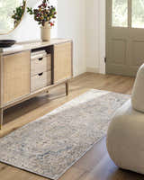 Entryway with beige Tuganay Luxe Performance Rug runner, wood floors, console table, and neutral decor. Roomscene-Runner