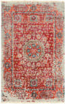 Close-up of the hand-knotted Tulare Clearance Rug. Features a traditional red, orange, and blue pattern on a gray wool blend. Design-Rectangle-23