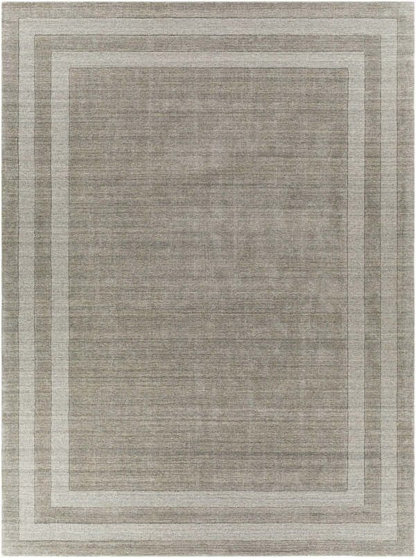 Close-up of the hand-tufted Turbotville Area Rug. Gray wool rug with a contemporary striped border design. Design-Rectangle-811