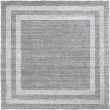 Close-up of the hand-tufted Turbotville Area Rug. Gray wool rug with a contemporary striped border design. Design-Square-8