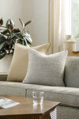 Trory Beige Throw Pillow