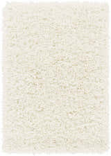 Close-up of the cream Umpire Area Rug, a hand woven shag rug with a soft, textured pile. Design-Rectangle-23