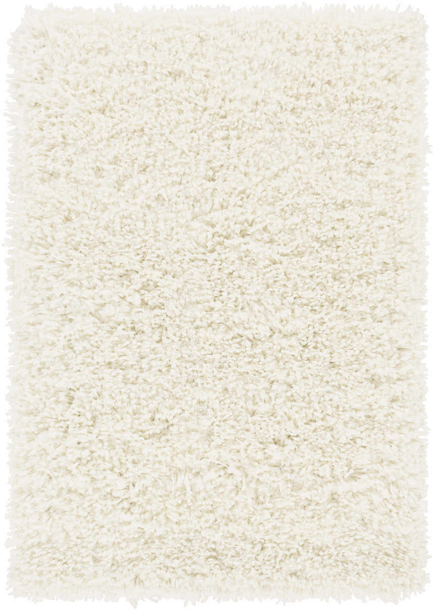 Close-up of the cream Umpire Area Rug, a hand woven shag rug with a soft, textured pile. Design-Rectangle-23
