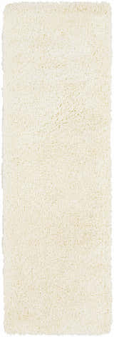 Close-up of the cream Umpire Area Rug. Hand woven shag rug with a soft, textured pile. Design-Runner-268