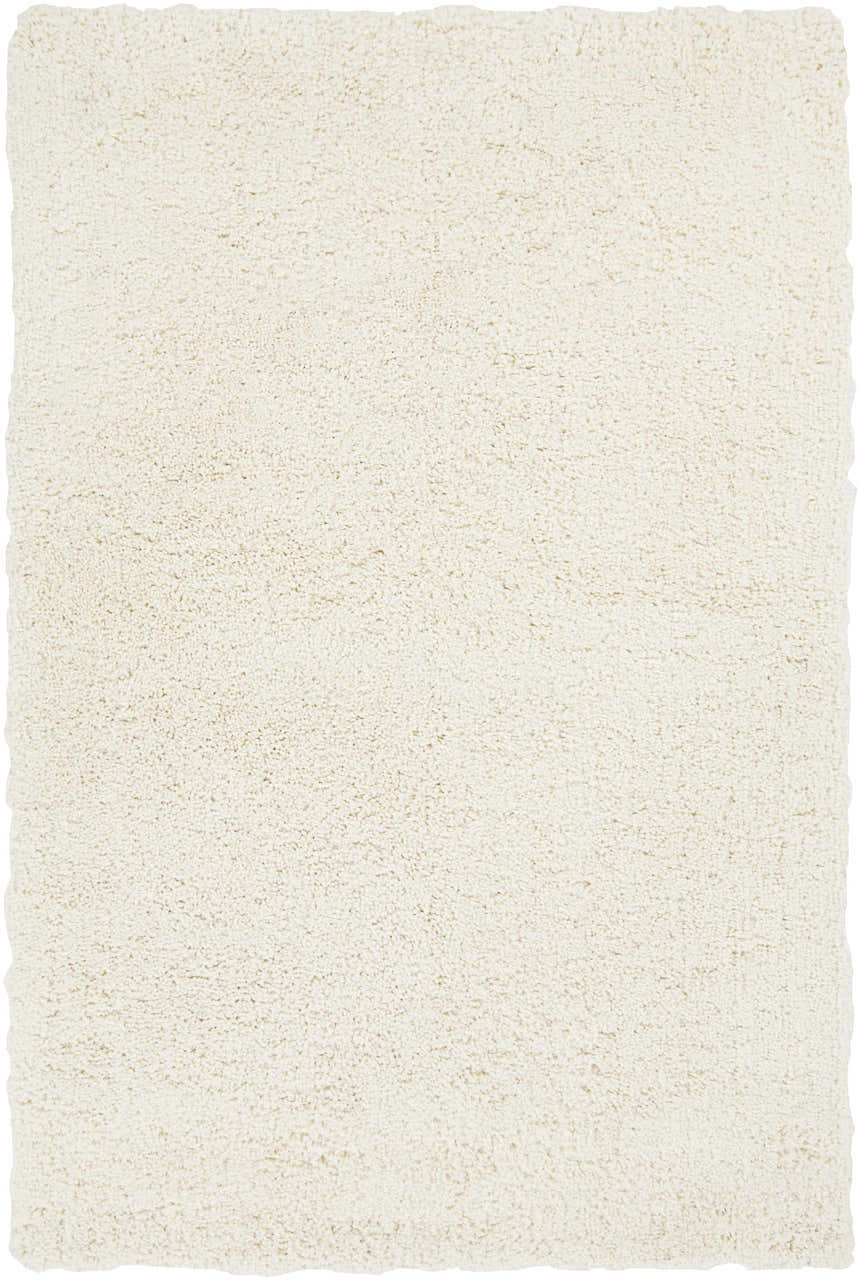 Close-up of the cream Umpire Area Rug. This hand woven shag rug has a soft, textured pile. Design-Rectangle-576