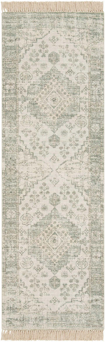 Close-up of Undy Handmade Cotton-blend Rug. Features a traditional green and white geometric pattern with fringe. Design-Runner-268