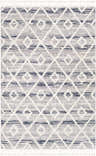 Close-up of Upham High/Low Pile Rug. Geometric diamond pattern in black, dark blue, gray, and white with tassels. Design-Rectangle-5373