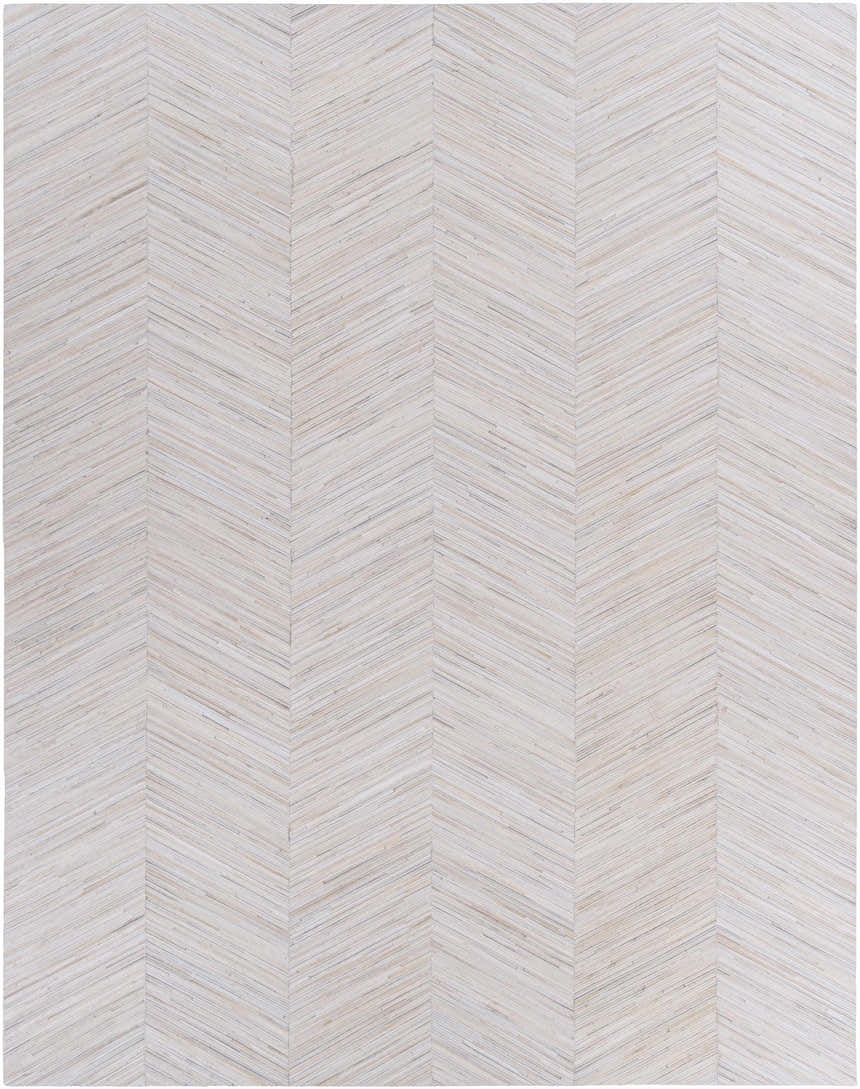 Close-up of Upland Premium Rug showing brown, cream, and gray tones in a contemporary herringbone pattern. Hair on hide texture. Design-Rectangle-810