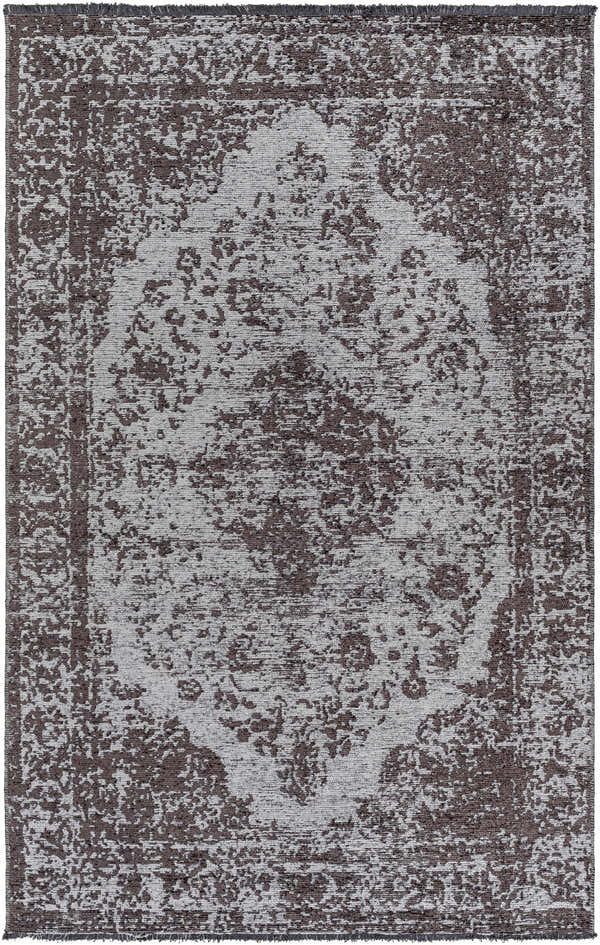 Close-up of the Ural Area Rug in charcoal and slate. Traditional oriental rug pattern with a distressed texture. Design-Rectangle-537