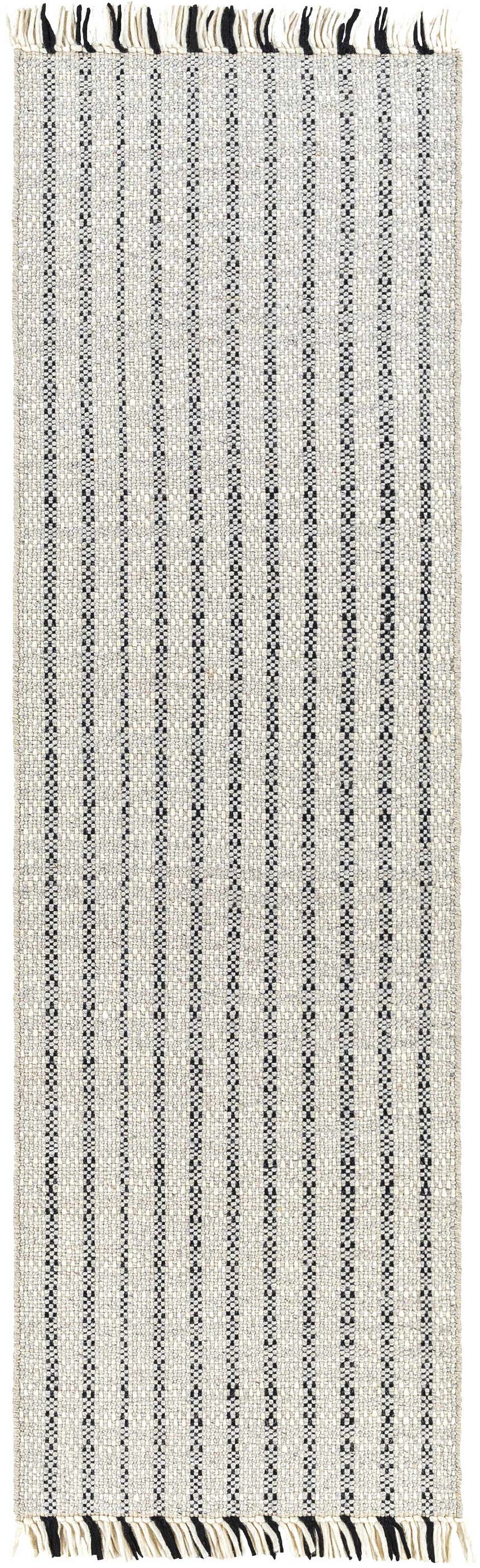 Close-up of the Varennes Area Rug: hand-woven wool rug with black stripes on a cream and light gray background. Tasseled fringe. Design-Runner-268