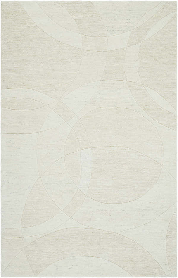Close-up of the Ville Modern Wool Rug. Light silver rug with a contemporary, abstract circle pattern and hand-tufted texture. Design-Rectangle-58