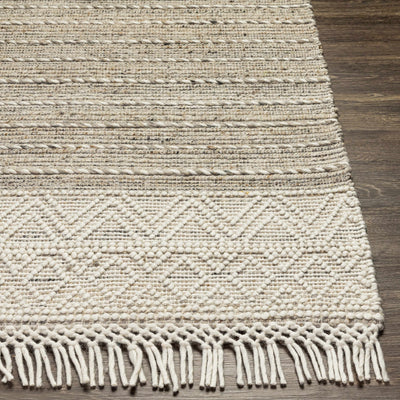 Cream Veruela Wool Blend Braided Tassel Area Rug