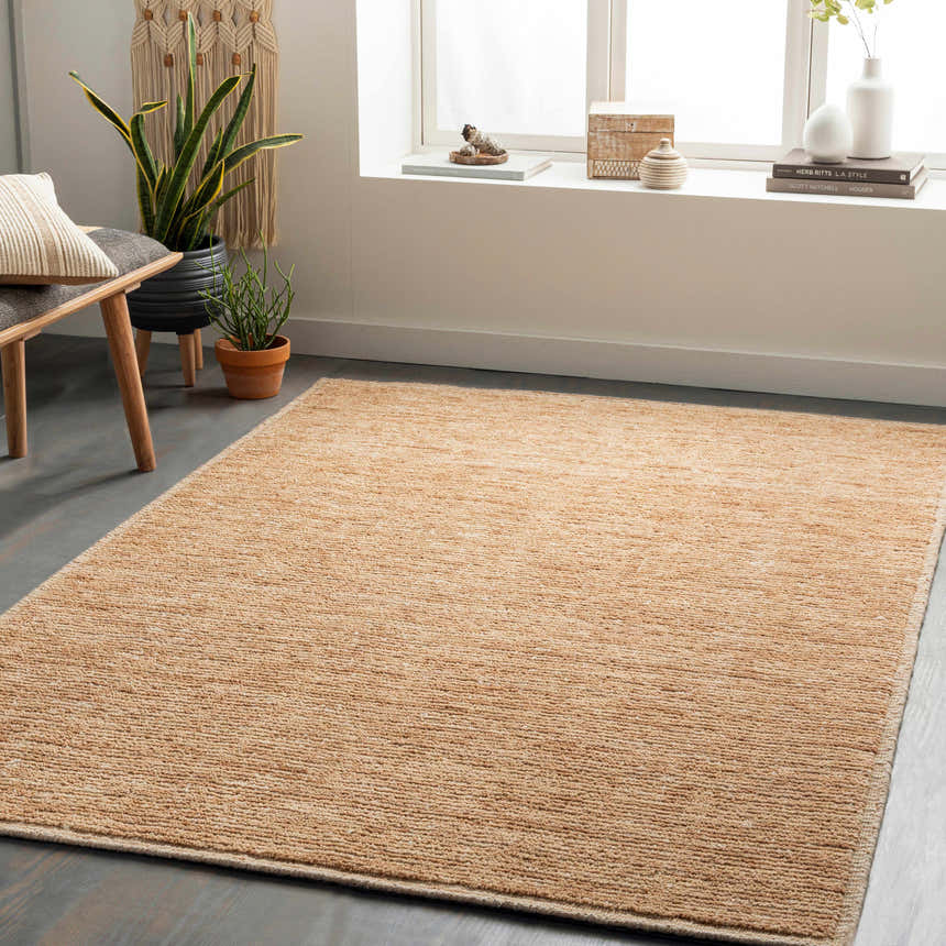 Living room scene with a peach Vezirhan area rug, wood bench, plants, and natural light from a window. Roomscene-Rectangle