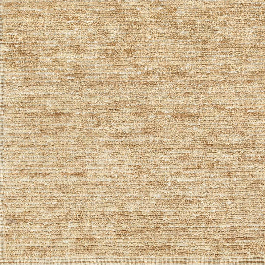 Close-up of the hand-loomed Vezirhan Area Rug. Peach and dark red cotton and wool fibers create a textured, contemporary design. Swatch