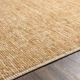 Close-up of the hand-loomed Vezirhan Area Rug, showcasing its peach and dark red cotton and wool texture. Texture