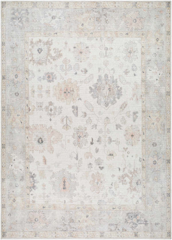 Close-up of the Valko Area Rug, a machine-woven rug with a traditional floral pattern in dusty pink, gray, and light brown hues. Design-Rectangle