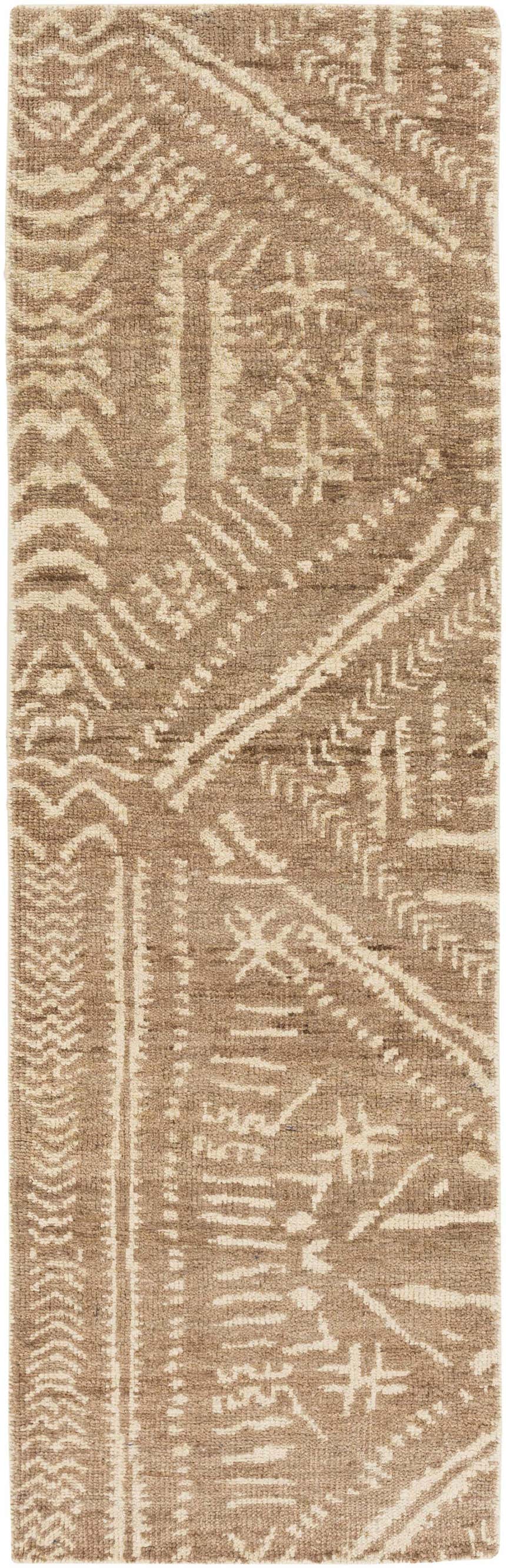 Close-up of the Wainfleet Jute Carpet showing its hand-knotted construction and geometric pattern in tan and ivory. Design-Runner-268
