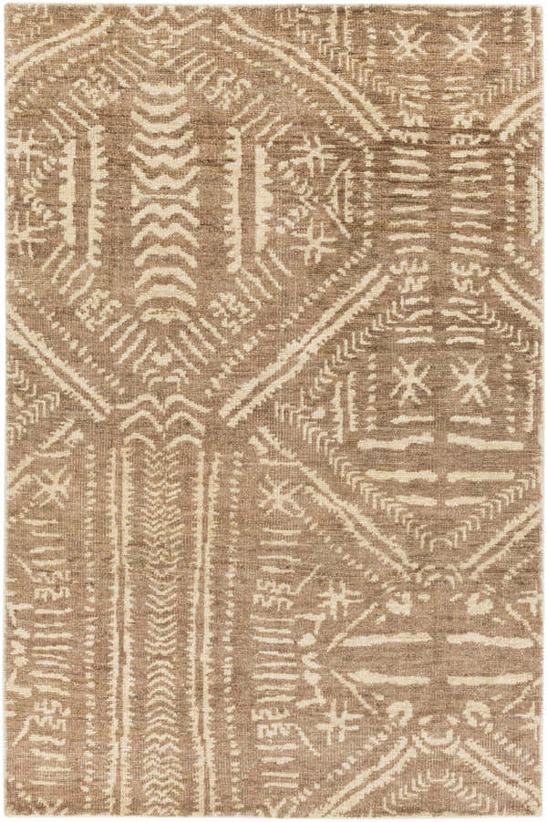Close-up of the Wainfleet Jute Carpet, featuring a farmhouse style with a traditional geometric pattern in brown and cream. Design-Rectangle-576