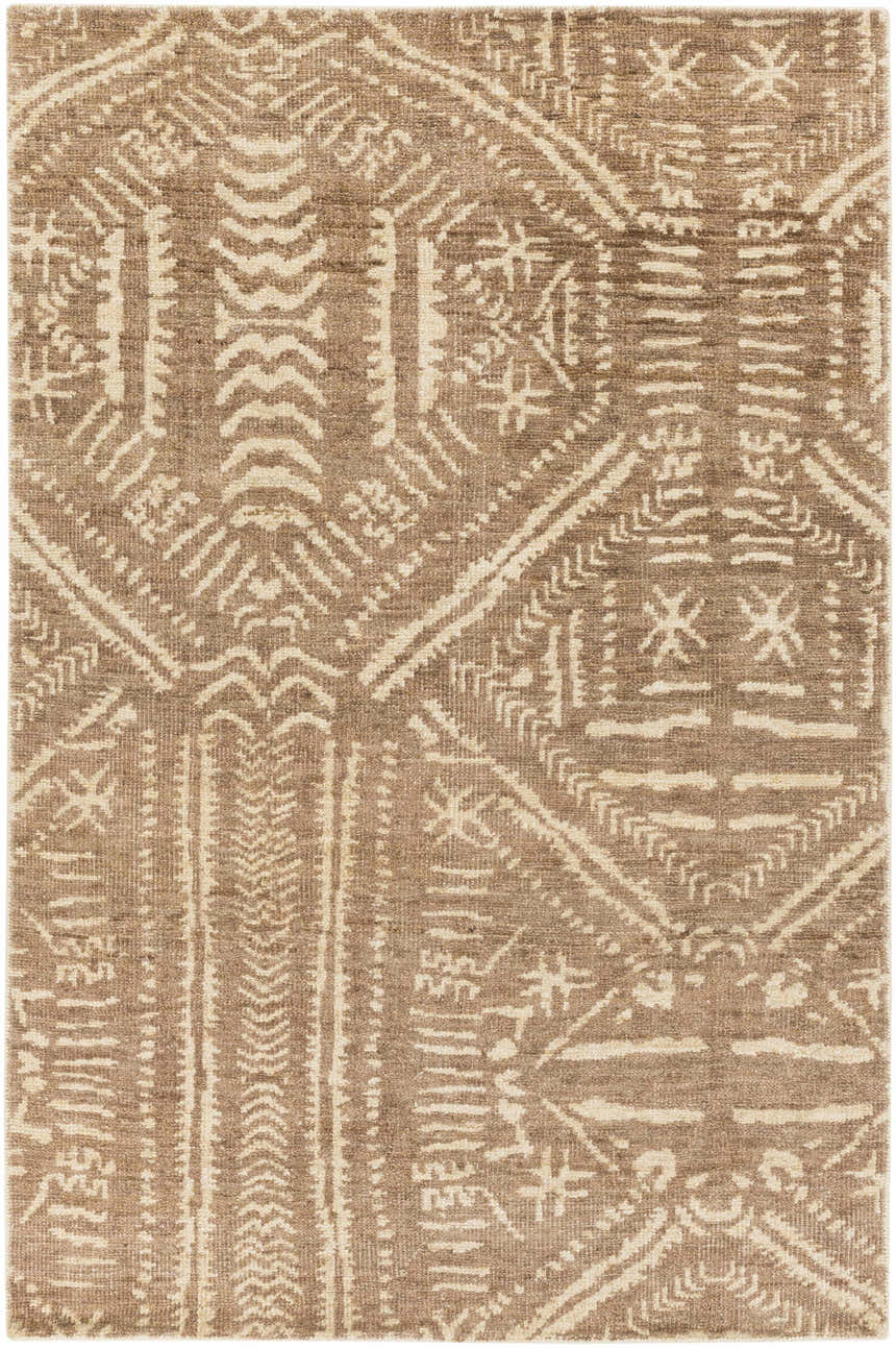 Close-up of the Wainfleet Jute Carpet, featuring a farmhouse style with a traditional geometric pattern in brown and cream. Design-Rectangle-576