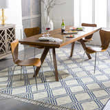 Dining room with a wood table and the blue and cream Walgett Carpet Area Rug. Roomscene-Rectangle